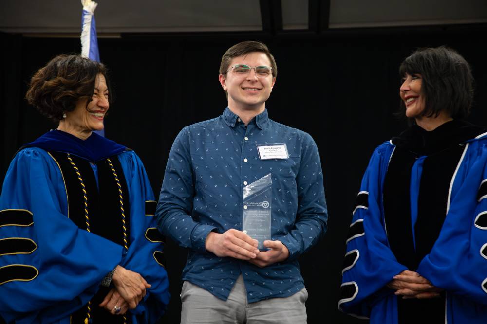 Student Niemeyer Award winner with President and Provost